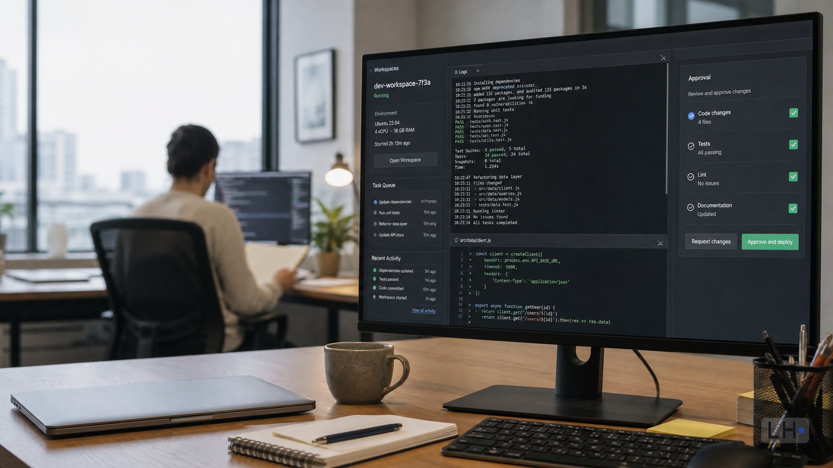 Desktop monitor showing code and logs in an office workspace.